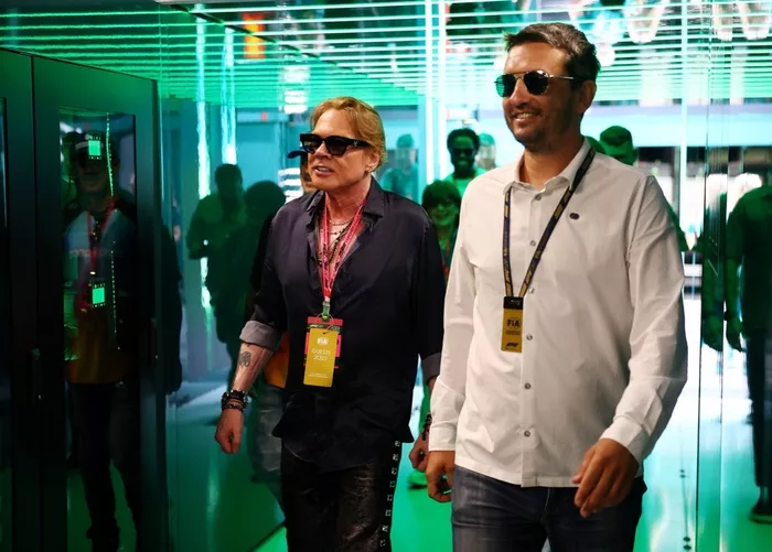 Axl Rose visits the Aston Martin F1 Team garage.