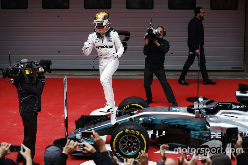 Lewis Hamilton, Mercedes AMG, celebrates victory in parc ferme