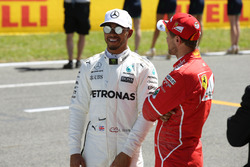 Pole man Lewis Hamilton, Mercedes AMG F1, Sebastian Vettel, Ferrari after Qualifying