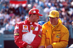 Michael Schumacher, Ferrari F310B, Ralf Schumacher, Jordan 197
