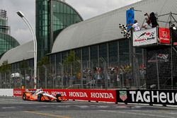 Josef Newgarden, Team Penske Chevrolet crosses the finish line under the checkered flag for the win