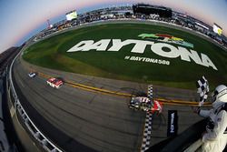 Kurt Busch, Stewart-Haas Racing Ford, takes the checkered flag