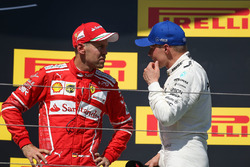 Podium: race winner Sebastian Vettel, Ferrari, third place Valtteri Bottas, Mercedes AMG F1