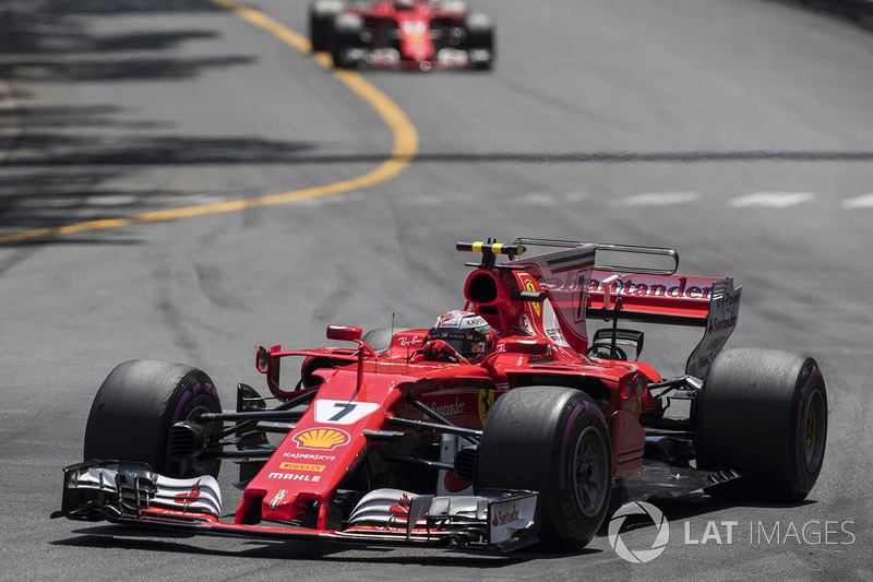 Kimi Raikkonen, Ferrari SF70-H leads Sebastian Vettel, Ferrari SF70-H