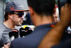 Fernando Alonso, McLaren, talks to press