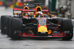 Daniel Ricciardo, Red Bull Racing RB13,. and Max Verstappen, Red Bull Racing RB13, wait in the pit l