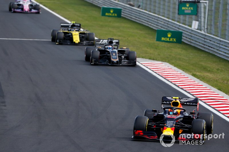 Pierre Gasly, Red Bull Racing RB15, leads Romain Grosjean, Haas F1 Team VF-19, and Nico Hulkenberg, Renault F1 Team R.S. 19