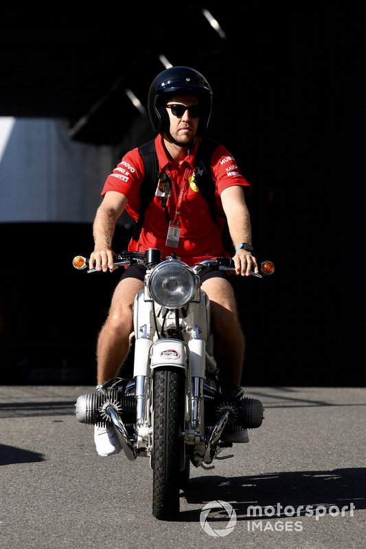 Sebastian Vettel, Ferrari, on a motorcycle
