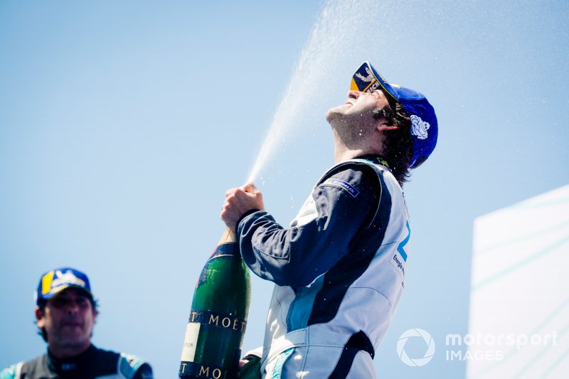 Race winner Sérgio Jimenez, Jaguar Brazil Racing celebrates with the champagne on the podium