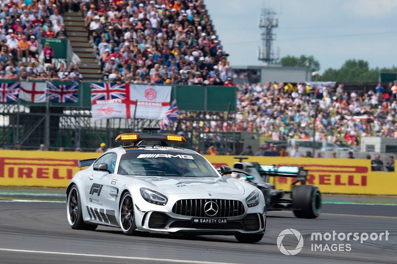 The Safety Car leads Lewis Hamilton, Mercedes AMG F1 W10