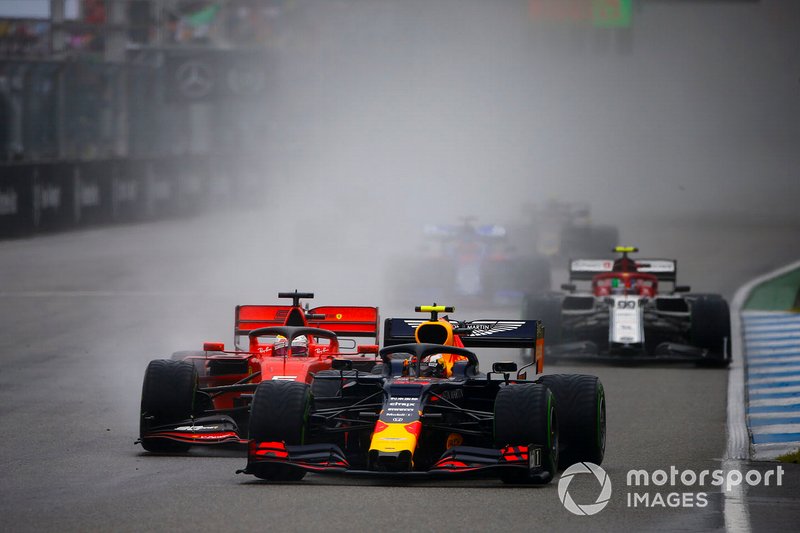 Pierre Gasly, Red Bull Racing RB15, leads Sebastian Vettel, Ferrari SF90, and Antonio Giovinazzi, Alfa Romeo Racing C38