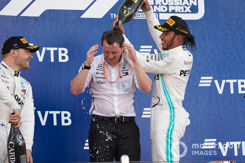 Lewis Hamilton, Mercedes AMG F1, 1st position, pours Champagne over Fred Judd, Chief Engineer Trackside, Mercedes AMG F1, on the podium