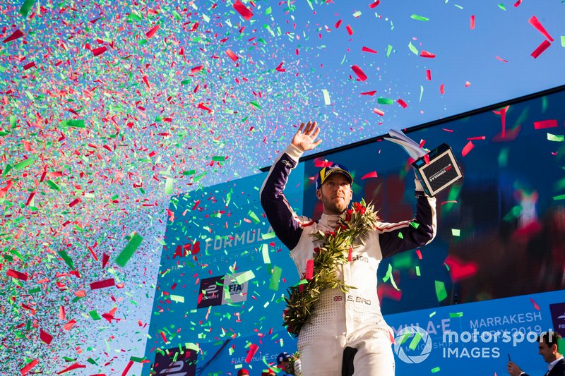 Confetti falls as Sam Bird, Envision Virgin Racing, 3rd position, celebrates on the podium