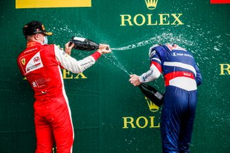 Race Winner Robert Shwartzman, Prema Racing and Mick Schumacher, Prema Racing celebrate on the podium with the champagne