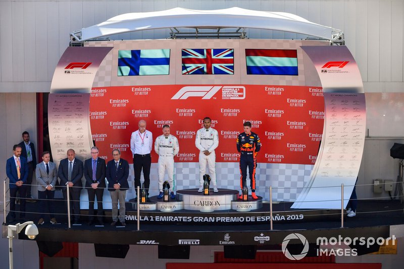 Dr Dieter Zetsche, CEO, Mercedes Benz, Valtteri Bottas, Mercedes AMG F1, Race Winner Lewis Hamilton, Mercedes AMG F1 and Max Verstappen, Red Bull Racing celebrate on the podium