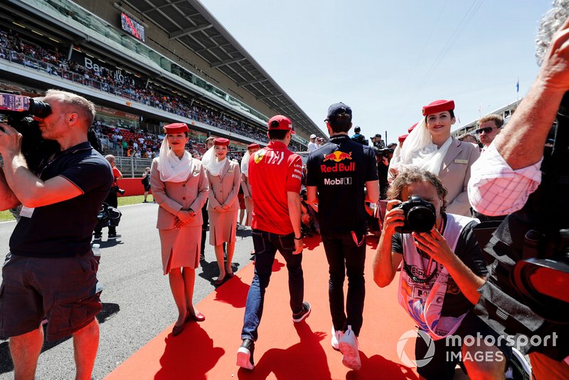 Charles Leclerc, Ferrari, and Pierre Gasly, Red Bull Racing, at the drivers parade
