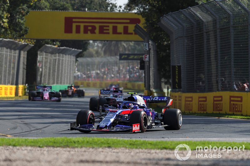 Alexander Albon, Toro Rosso STR14, leads Sergio Perez, Racing Point RP19, and Lance Stroll, Racing Point RP19