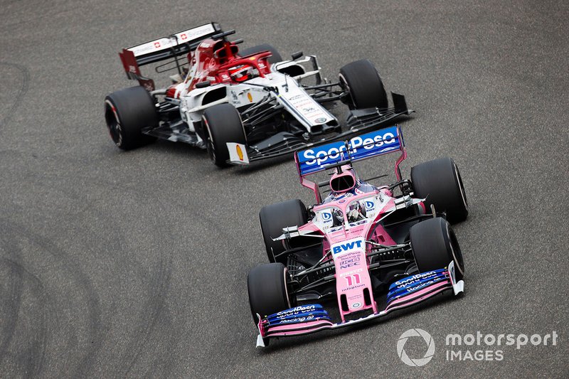 Sergio Perez, Racing Point RP19, leads Kimi Raikkonen, Alfa Romeo Racing C38