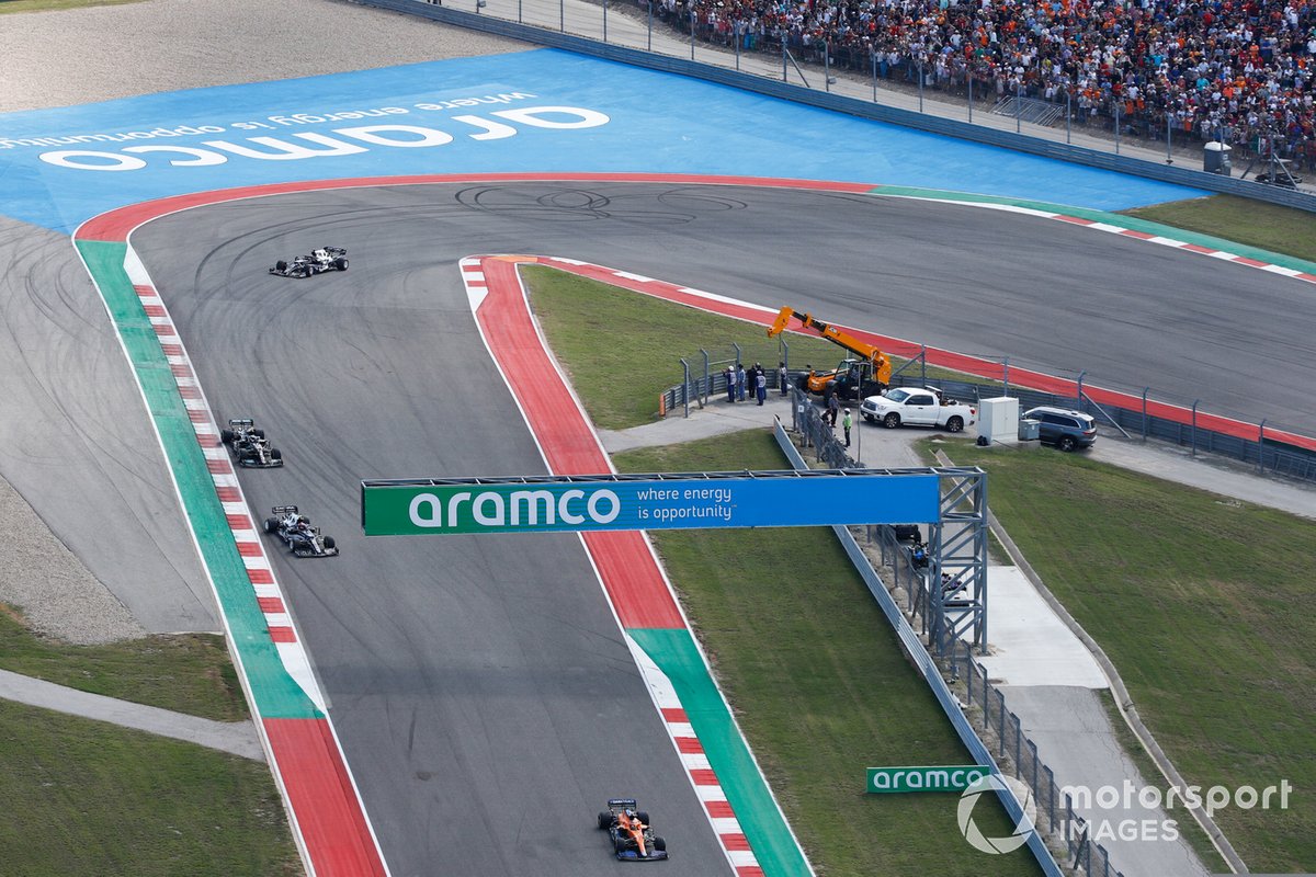 Lando Norris, McLaren MCL35M, Pierre Gasly, AlphaTauri AT02, Valtteri Bottas, Mercedes W12, and Yuki Tsunoda, AlphaTauri AT02