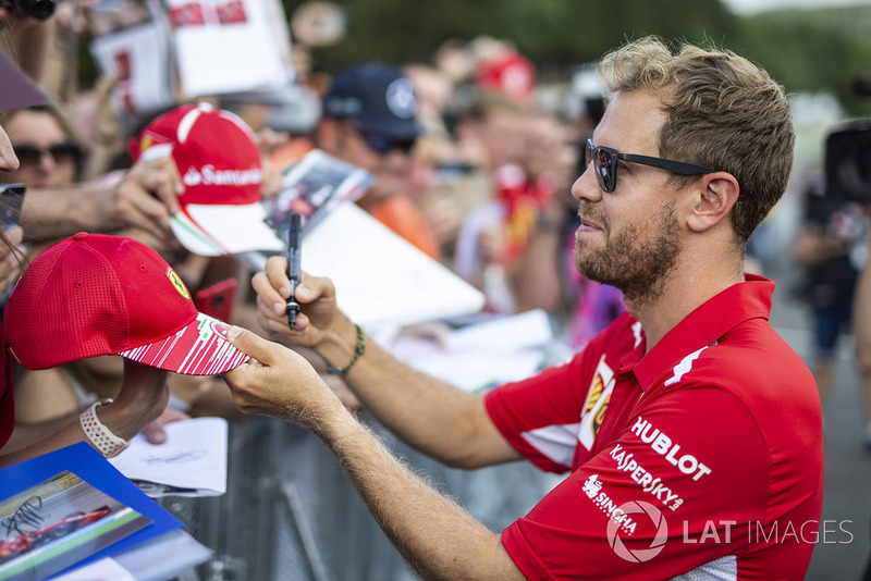 Sebastian Vettel, Ferrari signs autographs for the fans