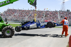 The car of Pascal Wehrlein, Sauber C36 is recovered after crashing in Q1