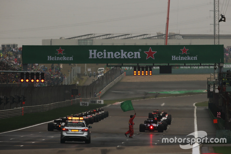 The drivers line up for the start and wait for the lights to go out