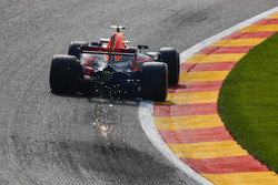 Sparks fly from the car of Max Verstappen, Red Bull Racing RB13