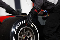 A Pirelli tyre is changed on the Romain Grosjean Haas F1 Team VF-17