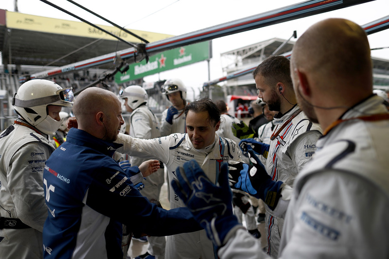 Felipe Massa, Williams, is applauded by the time on arrival back at the garage after retiring from the race in his last home Grand Prix