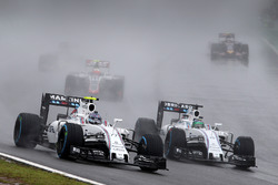 Valtteri Bottas, Williams FW38 and team mate Felipe Massa, Williams FW38 battle for position