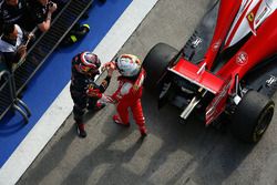 Sebastian Vettel, Ferrari and Daniil Kvyat, Red Bull Racing in parc ferme