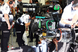 The McLaren MP4-31 of Stoffel Vandoorne, McLaren is worked on by mechanics