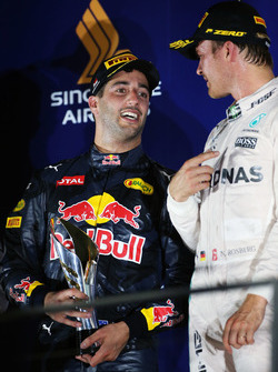(L to R): second placed Daniel Ricciardo, Red Bull Racing and race winner Nico Rosberg, Mercedes AMG F1 on the podium