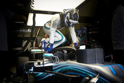 Valtteri Bottas, Mercedes AMG F1, climbs in to his car