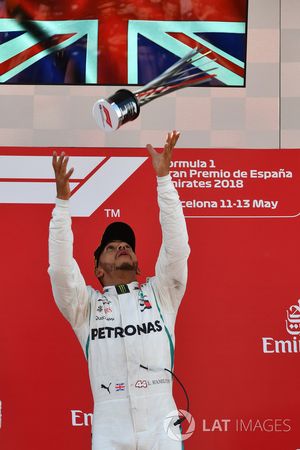 Race winner Lewis Hamilton, Mercedes-AMG F1 celebrates on the podium with the trophy