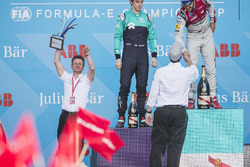 Allan McNish, Team Principal, Audi Sport Abt Schaeffler, celebrates with the trophy on the podium