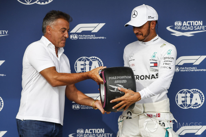 Jean Alesi presents Lewis Hamilton, Mercedes AMG F1, with the Pirelli Pole Position award