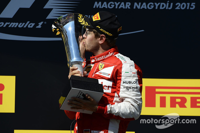 Podio: ganador de la carrera Sebastian Vettel, Ferrari