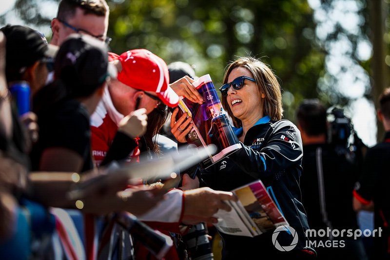 Claire Williams, Deputy Team Principal, Williams Racing signs autographs for fans