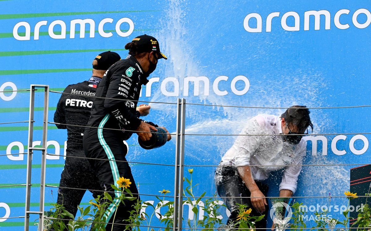 Lewis Hamilton, Mercedes-AMG Petronas F1, 1st position, and Valtteri Bottas, Mercedes-AMG Petronas F1, 3rd position, on the podium