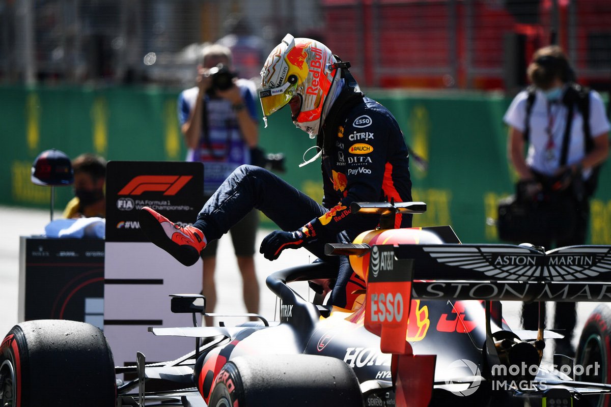 Max Verstappen, Red Bull Racing RB16, climbs from his car on the grid after qualifying