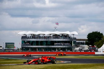 Sebastian Vettel, Ferrari SF90, leads Charles Leclerc, Ferrari SF90