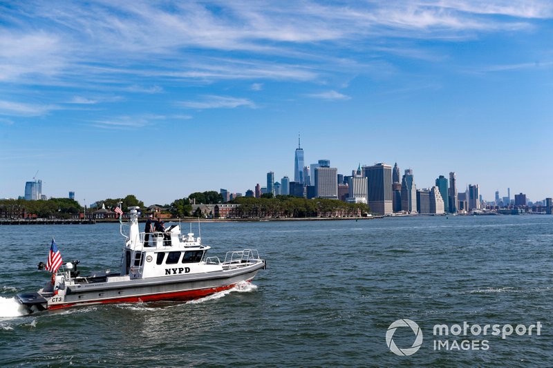 New York Police Department boat past the skyline