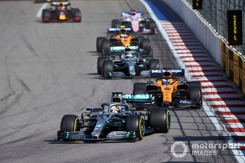 Lewis Hamilton, Mercedes AMG F1 W10, leads Carlos Sainz Jr., McLaren MCL34, Valtteri Bottas, Mercedes AMG W10, and Lando Norris, McLaren MCL34