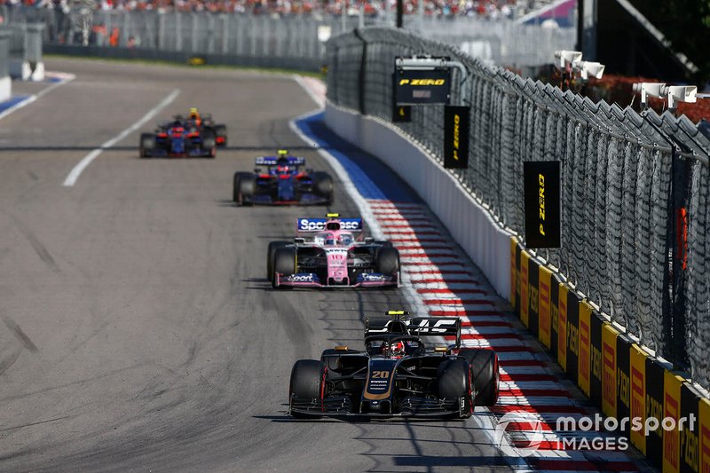 Kevin Magnussen, Haas F1 Team VF-19, leads Lance Stroll, Racing Point RP19, Pierre Gasly, Toro Rosso STR14, and Daniil Kvyat, Toro Rosso STR14