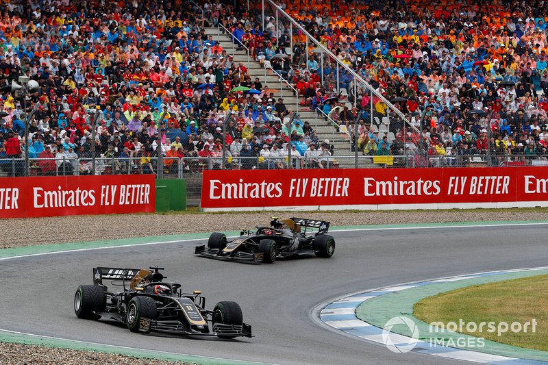 Romain Grosjean, Haas F1 Team VF-19, leads Kevin Magnussen, Haas F1 Team VF-19
