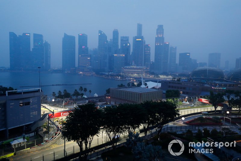 A scenic view of the Singapore skyline on an overcast day