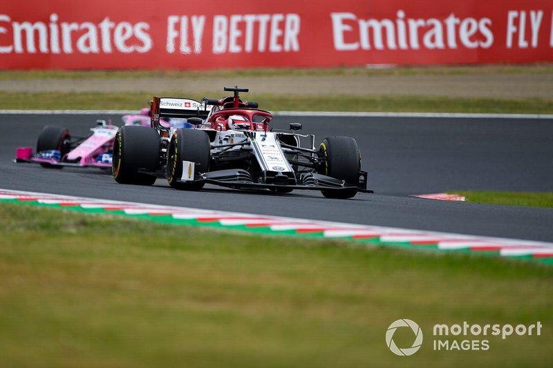 Kimi Raikkonen, Alfa Romeo Racing C38, leads Lance Stroll, Racing Point RP19