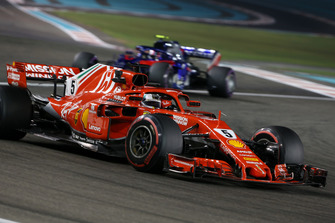 Sebastian Vettel, Ferrari SF71H and Pierre Gasly, Scuderia Toro Rosso STR13