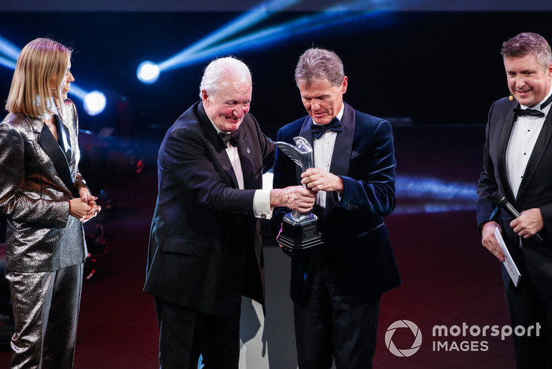 Paddy Hopkirk presents the Rally Car of the Year Award to Malcolm Wilson